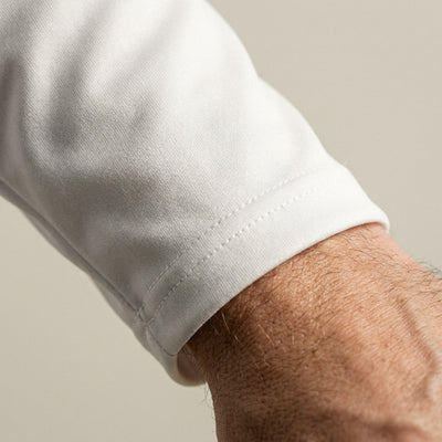 Double-needle stitched cuff on the Waterline custom boat long-sleeve